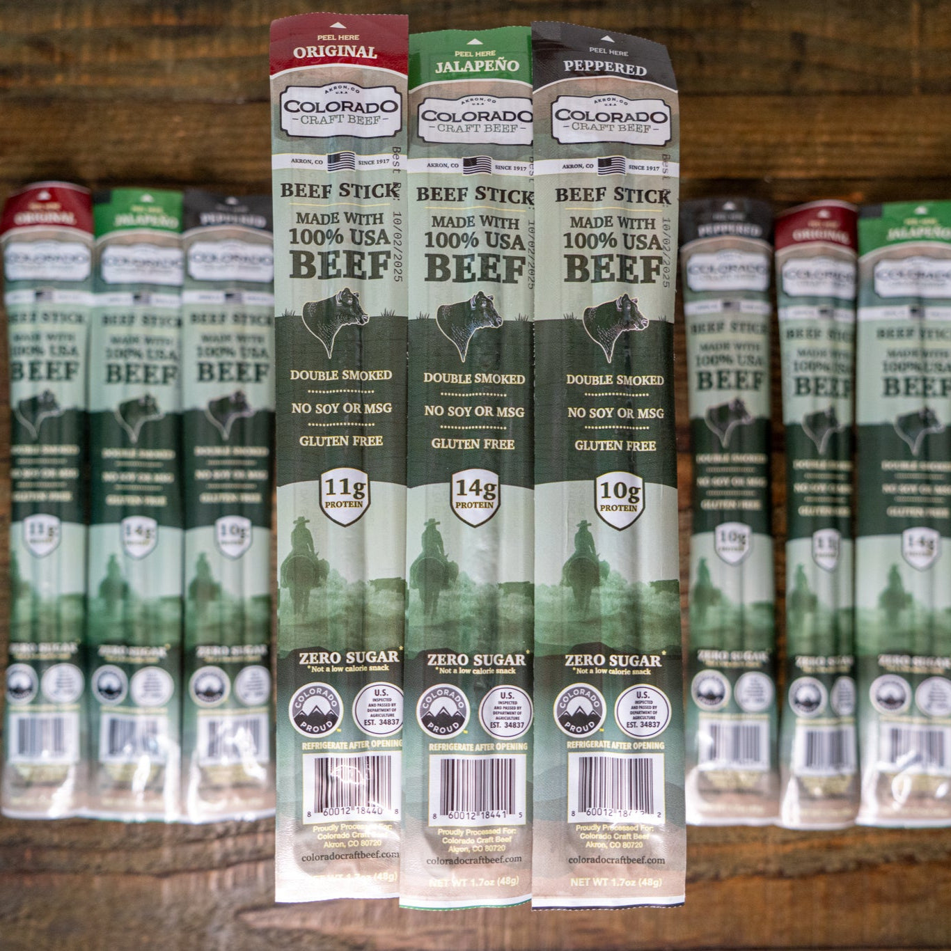 Packaged beef sticks on a wooden surface